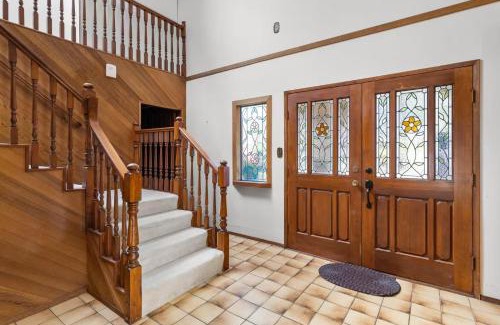Ladner Casa | Master bedroom with spacious bathroom