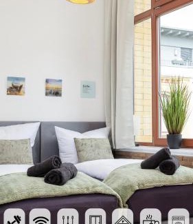 Sonnenberg Apartamento | mayhome - das STRANDLOFT schönes Studioapartment mit Balkon, Küche und Tiefgarage - Sauna und Fitness direkt nebenan