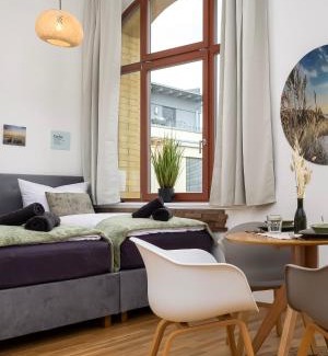 Sonnenberg Apartamento | mayhome - das STRANDLOFT schönes Studioapartment mit Balkon, Küche und Tiefgarage - Sauna und Fitness direkt nebenan