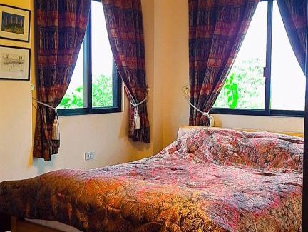 Mambajao Apartamento | Mccormick-Residence Gardens Resort