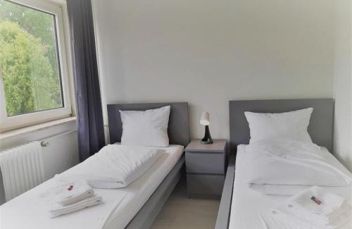 Bramfeld Apartamento | Mehrbett-Apartment 4 Citynah, einfache Ausstattung