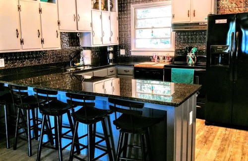 New London Casa | Cielo azul en el lago Badin