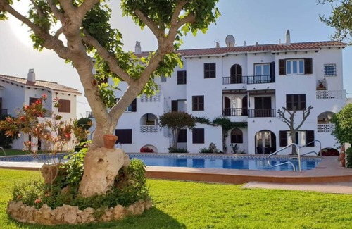Sol del Este Apartamento | Menorca: hermoso apartamento de 3 dormitorios en planta baja con magníficas vistas