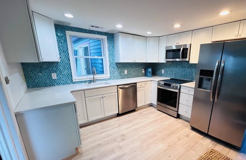 Chincoteague Casa | Mermaid & Mare, Downtown Retreat. Hot Tub, Firepit, fenced yard & Pet Friendly!