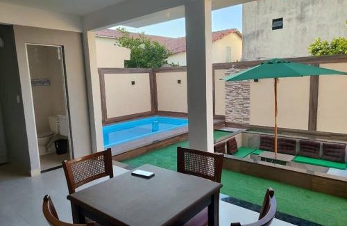 Palmeiras Casa | Meu cantinho com ar e piscina