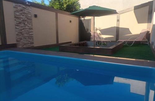 Palmeiras Casa | Meu cantinho com ar e piscina