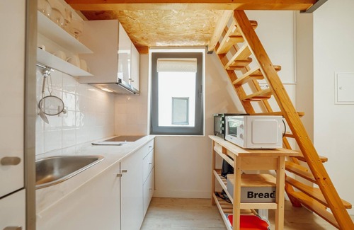 Bonfim Apartamento | Mezzanine Stylish Apartment Q by Vacationy
