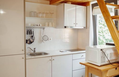 Bonfim Apartamento | Mezzanine Stylish Apartment Q by Vacationy