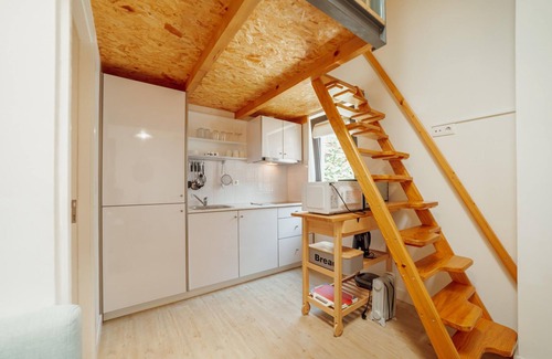 Bonfim Apartamento | Mezzanine Stylish Apartment Q by Vacationy