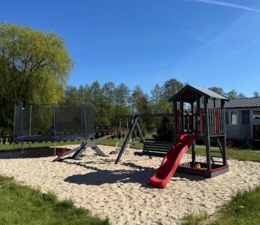 Kolczewo Otro | MIĘDZY NAMI domki nad jeziorem