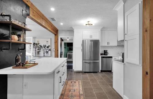 Lakewood Casa | Mid-Century Boho Chic home with Pool, Game Room & Outdoor Playhouse.