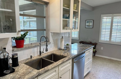 Vamo Casa | Midcentury Waterfront Neighborhood Oasis: Beaches and Sarasota Charm