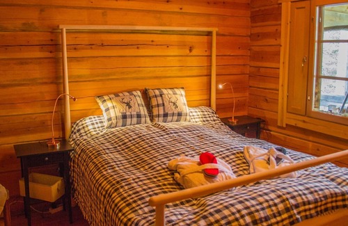 Inari Cabina | Sol de medianoche en la Laponia finlandesa