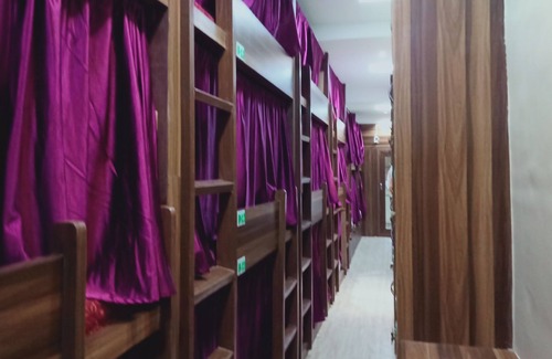 Vile Parle East Hotel | Millano Dormitory