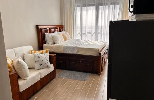 Syokimau Apartamento | Mimah's cozy getaway near JKIA at Taurus Residences