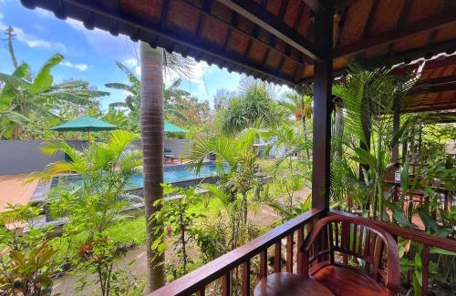 Mushroom Bay Complejo | Mimpi Cottages