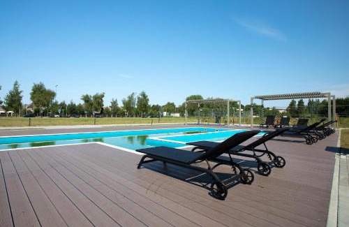 Sventoji Apartamento | Mindaugo apartamentai su šildomu baseinu, sporto sale, vaikų kambariu, work zona