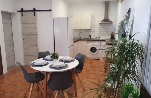 Chiclana de la Frontera Casa | Minichalet Jacaranda con piscina, jardín y barbacoa.