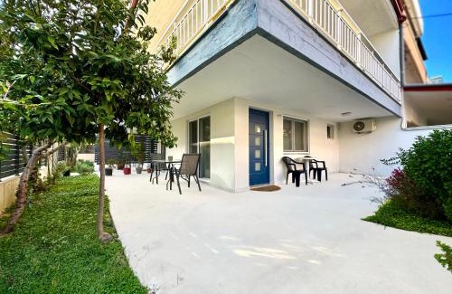 Olymbiaki Akti Casa | Minimalist Seaside Apartment with Private Patio and Parking - Blue Zone Homes