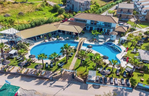 Arillas Apartamento | 'Mirage Arillas Honeymoon Studio' con vistas al mar, piscina compartida y Wi-Fi