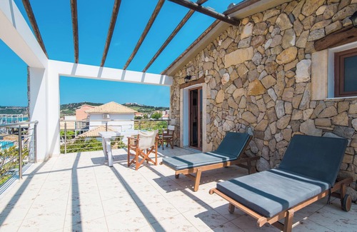 Arillas Apartamento | 'Mirage Arillas Honeymoon Studio' con vistas al mar, piscina compartida y Wi-Fi