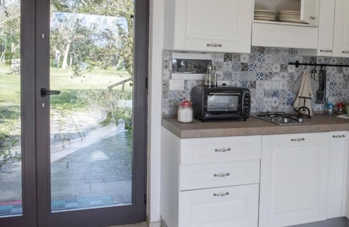 Novoli Condominio | MIRTO -monolocale with private hot tub nestled in the greenery of Salento