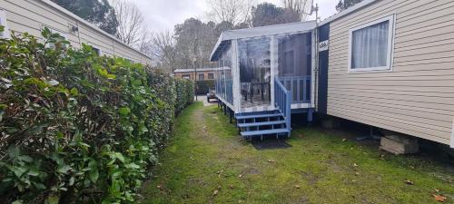 Gastes Otro | Mobil home 693 à la réserve 8 personnes avec terrasse couverte