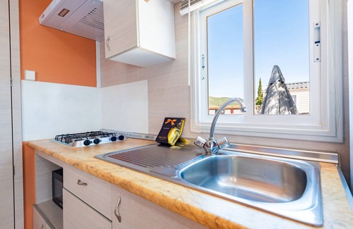 Tirig Alquiler De RV | Mobil Home '243' con vistas a la montaña, Wi-Fi y aire acondicionado