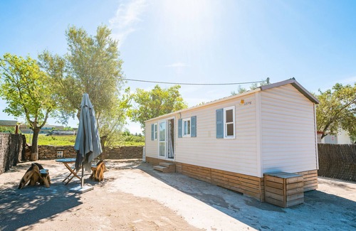 Tirig Alquiler De RV | Mobil Home '243' con vistas a la montaña, Wi-Fi y aire acondicionado