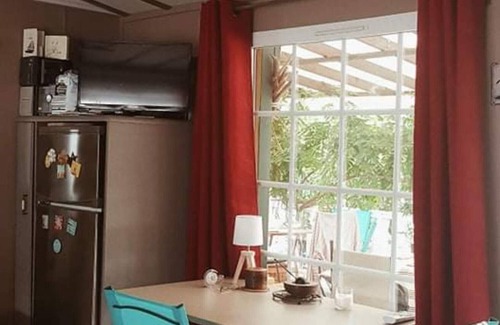 Claouey Alquiler De RV | Mobil Home 'Le Bungalow Du Bassin' con piscina compartida, terraza privada y aire acondicionado