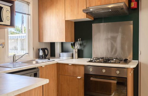 Ronce-les-Bains Alquiler De RV | Mobil Home 'Mh 428 Ronce Les Bains' con piscina compartida, terraza y aire acondicionado