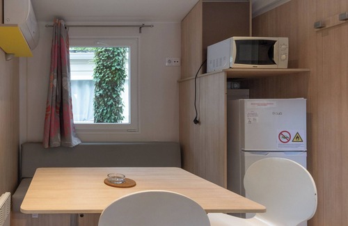 Lavilledieu Casa | Casa móvil 'Mobil-home C - 1-4 pers' con piscina compartida, terraza privada y jardín compartido