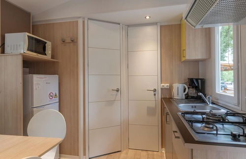 Lavilledieu Casa | Casa móvil 'Mobil-home C - 1-4 pers' con piscina compartida, terraza privada y jardín compartido