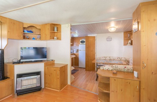 La Tremblade Alquiler De RV | Mobilhome 'Mobilhome Mh343' con piscina compartida, terraza privada y jardín privado