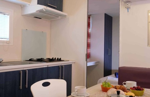 Santa Lucia Casa | Mobilehome with air conditioning, pool and semi-covered wooden terrace