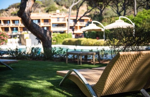 Roccamare Apartamento | Estudio moderno con piscina gemeinschaftlichen