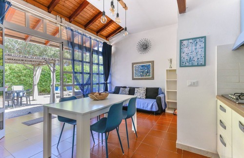 Lacona Apartamento | Moderno apartamento vacacional con jardín, aire acondicionado y Wi-Fi
