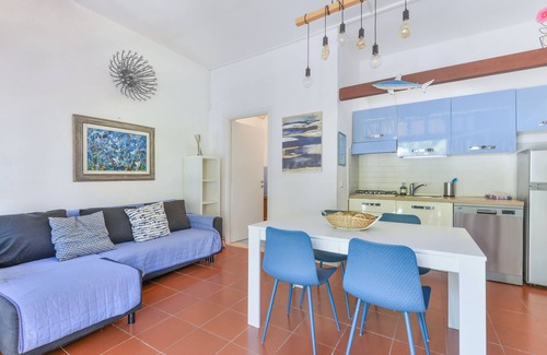 Lacona Apartamento | Moderno apartamento vacacional con jardín, aire acondicionado y Wi-Fi