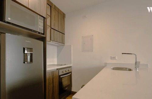 Chico Norte III Apartamento | Modern 1BR in Luxury Building in Chico