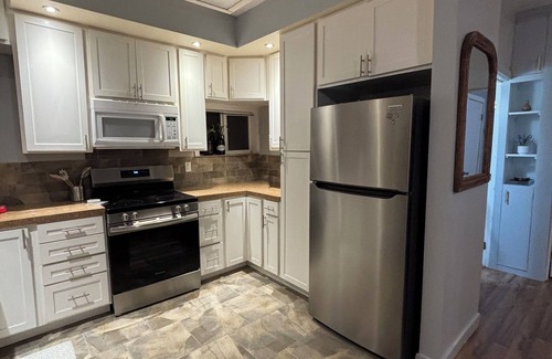 Olympia Casa | Modern 2 bedroom, 1 bath bright unit with Stunning Sunrises.