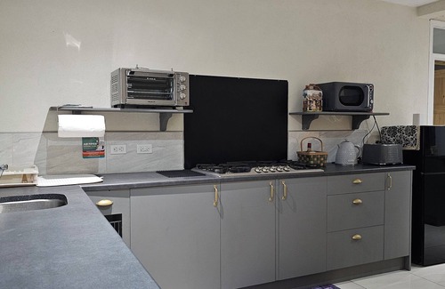 Oistins Casa | Modern 2 bedroom apartment.. 10 minute walking distance from the beach.