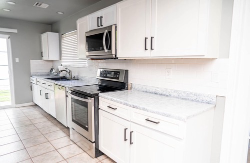Northeast Carrollton Casa | Modern 2-bedroom home with loft and indoor fireplace!
