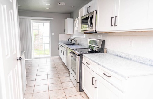 Northeast Carrollton Casa | Modern 2-bedroom home with loft and indoor fireplace!