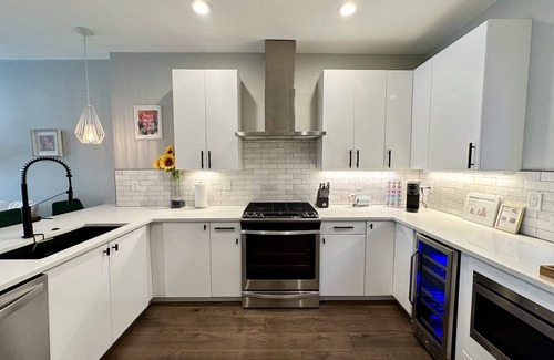 West Colfax Casa | Modern 2-Bedroom - Walk to Broncos w/ Hot Tub, Patio, & Fireplace!