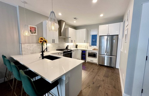 West Colfax Casa | Modern 2-Bedroom - Walk to Broncos w/ Hot Tub, Patio, & Fireplace!