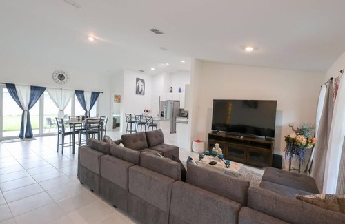 Port Malabar Casa | "Modern 4BR, 2BA home: brand new, spacious & family-friendly in prime location!"