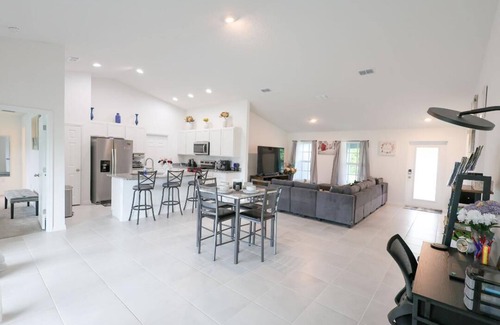 Port Malabar Casa | "Modern 4BR, 2BA home: brand new, spacious & family-friendly in prime location!"