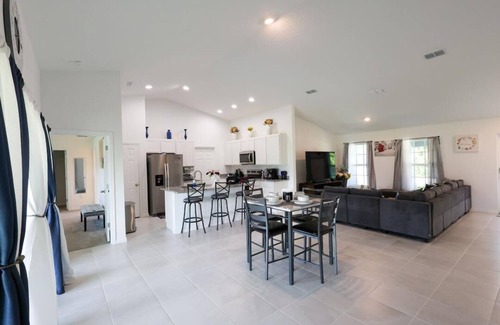 Port Malabar Casa | "Modern 4BR, 2BA home: brand new, spacious & family-friendly in prime location!"