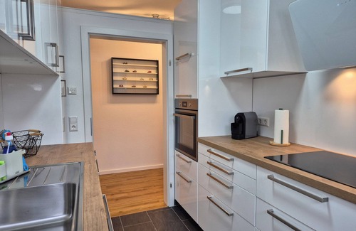 Schwieberdingen Apartamento | Modern 5-room apartment with roof terrace and conservatory
