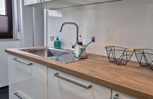 Schwieberdingen Apartamento | Modern 5-room apartment with roof terrace and conservatory